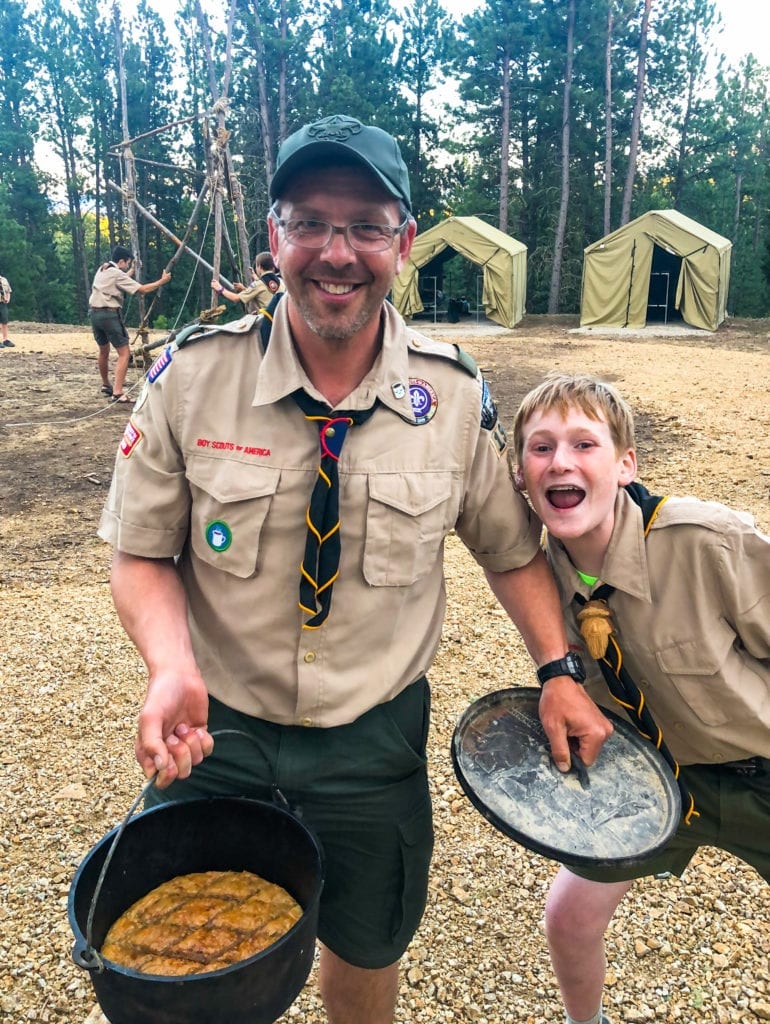 Photo Contest, First Place Winner:  Eric Henderson, Scoutmaster, Troop 1911, Missoula, (Leader with Dutch Oven Baklava for Scouts at K-M Scout Ranch)