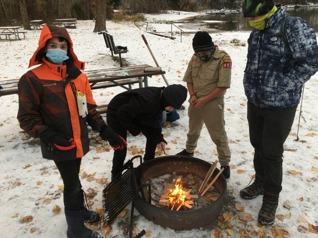 Photo contest, Youth 3rd Place Winner:  Gavin Carmichael, Troop 1936, Whitefish (New Scouts Making Fire (Covid Edition) Fall 2020)