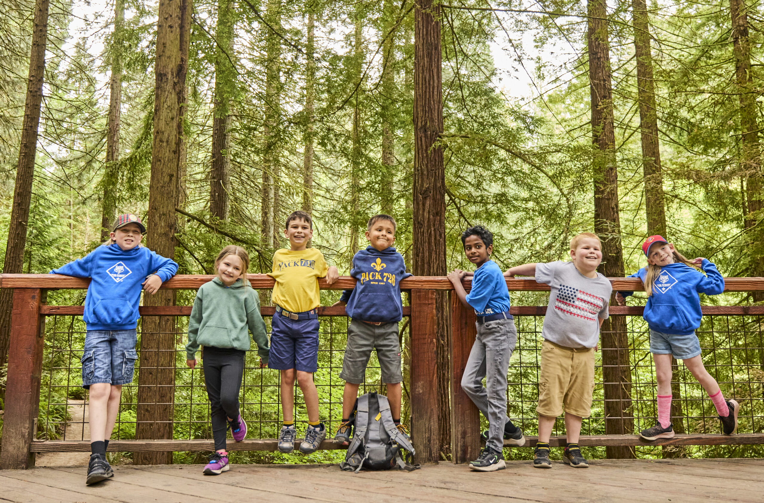 Cub scouts hiking on an outdoor adventure.